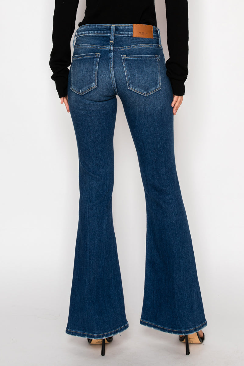 Artemis Vintage Margaret low-rise vintage flare jeans in dark-wash stretch denim with knee distressing.
