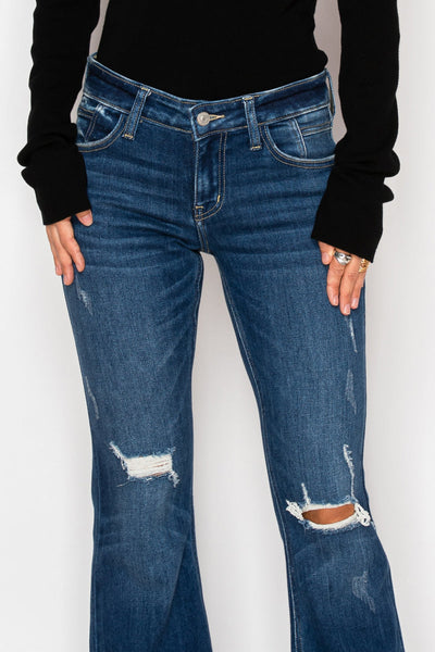 Artemis Vintage Margaret low-rise vintage flare jeans in dark-wash stretch denim with knee distressing.